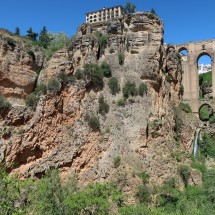 Rocks of Ronda with the waterfall of Rio Guadalevin and the famous bridge Puente Nuevo